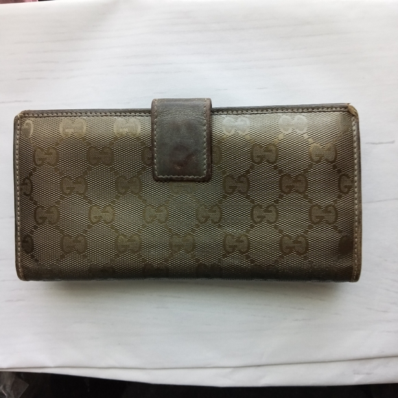 Authentic Gucci Metallic brown Signature wallet with GG charm - Picture 13 of 16